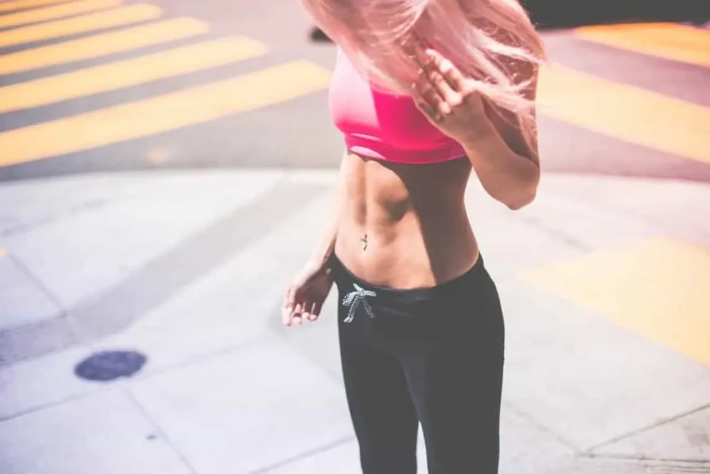 Woman with toned stomach after LA-EMS Body Sculpting Treatment Romford
