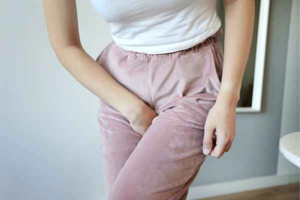 woman running for the toilet because of urinary incontinence Romford